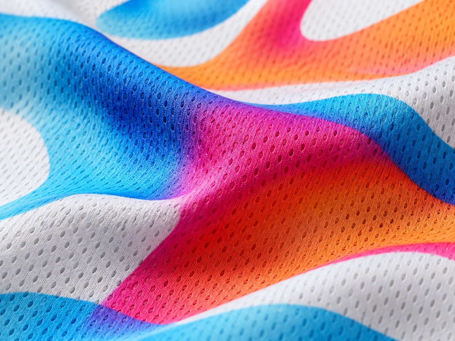 ตัวอย่างงานพิมพ์ Sublimation สีสดบนผ้าโพลีเอสเตอร์ตาข่าย